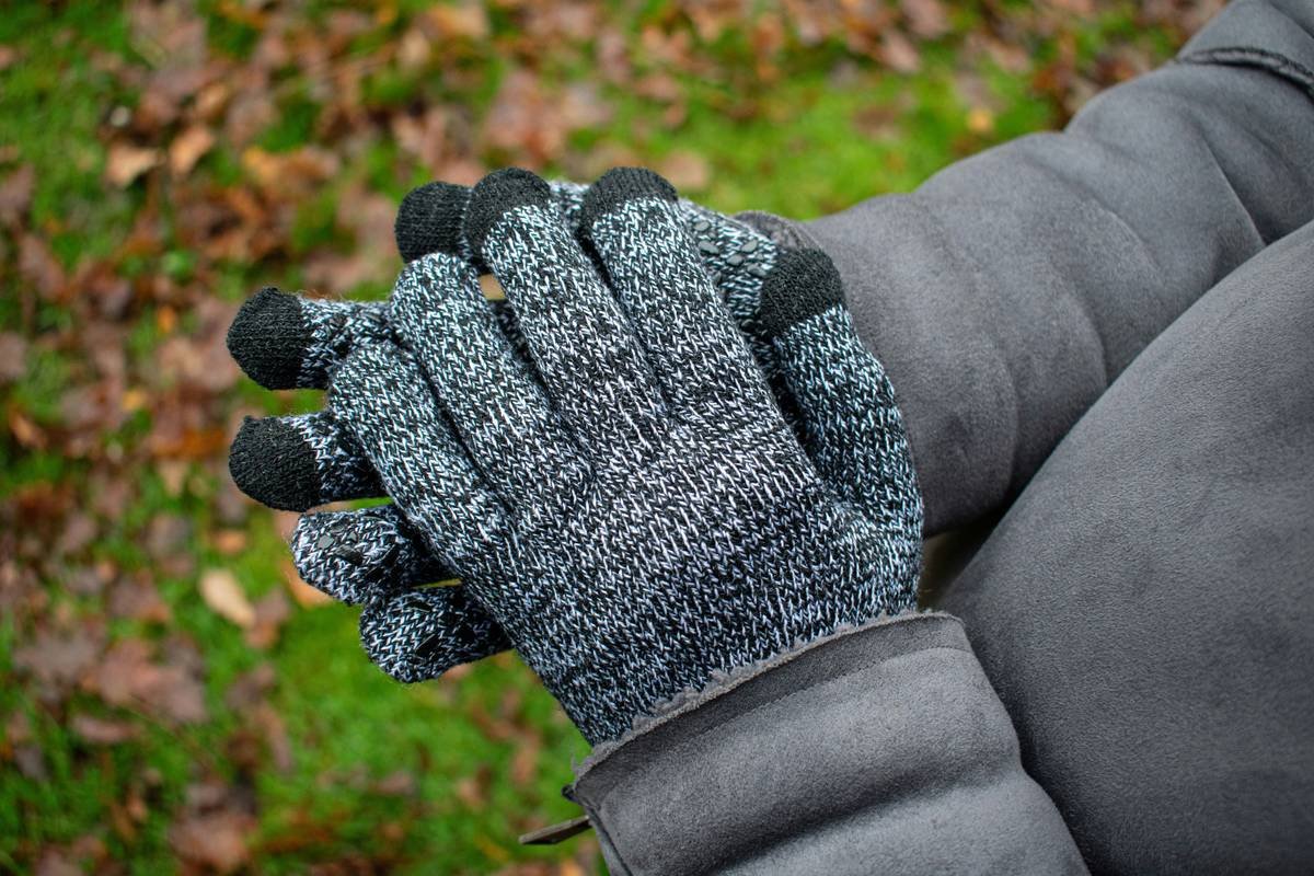 A close-up shot of professional-grade climbing gloves designed for enhanced mobility