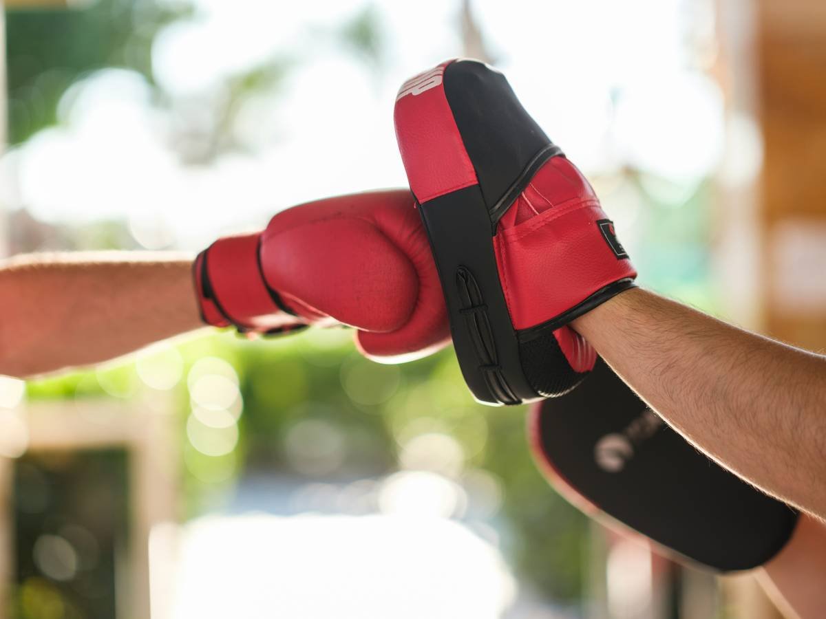 A pair of high-quality climbing gloves designed to reduce strain on finger joints.