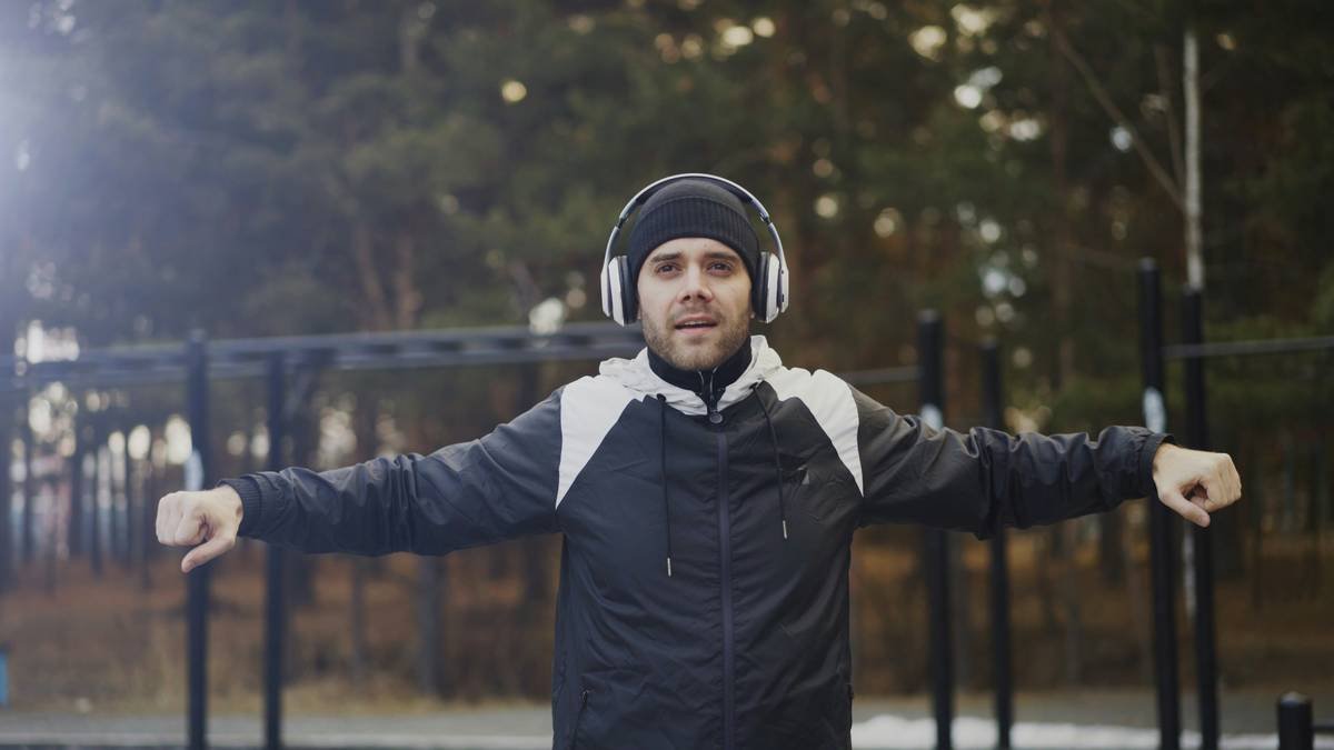 Close-up image of climbing gloves showcasing reinforced padding and breathable mesh material
