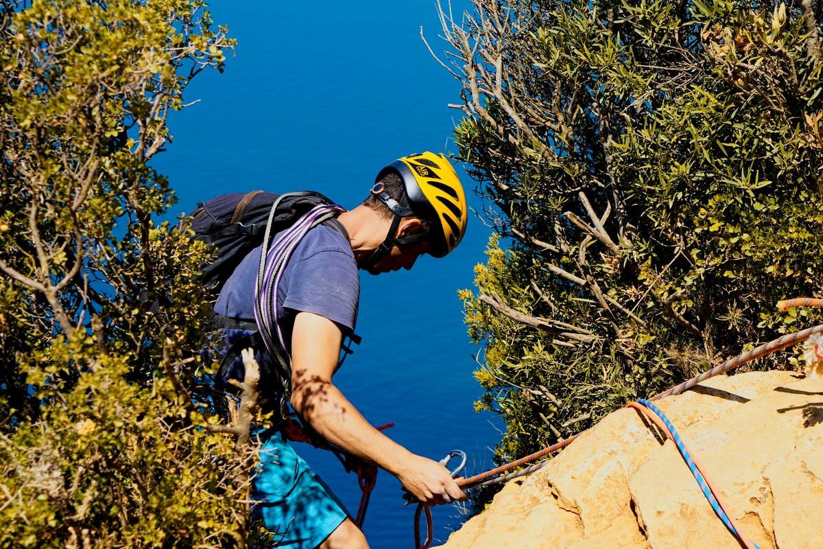 Close-up image showing climbing gloves protecting hands from blisters and abrasions.