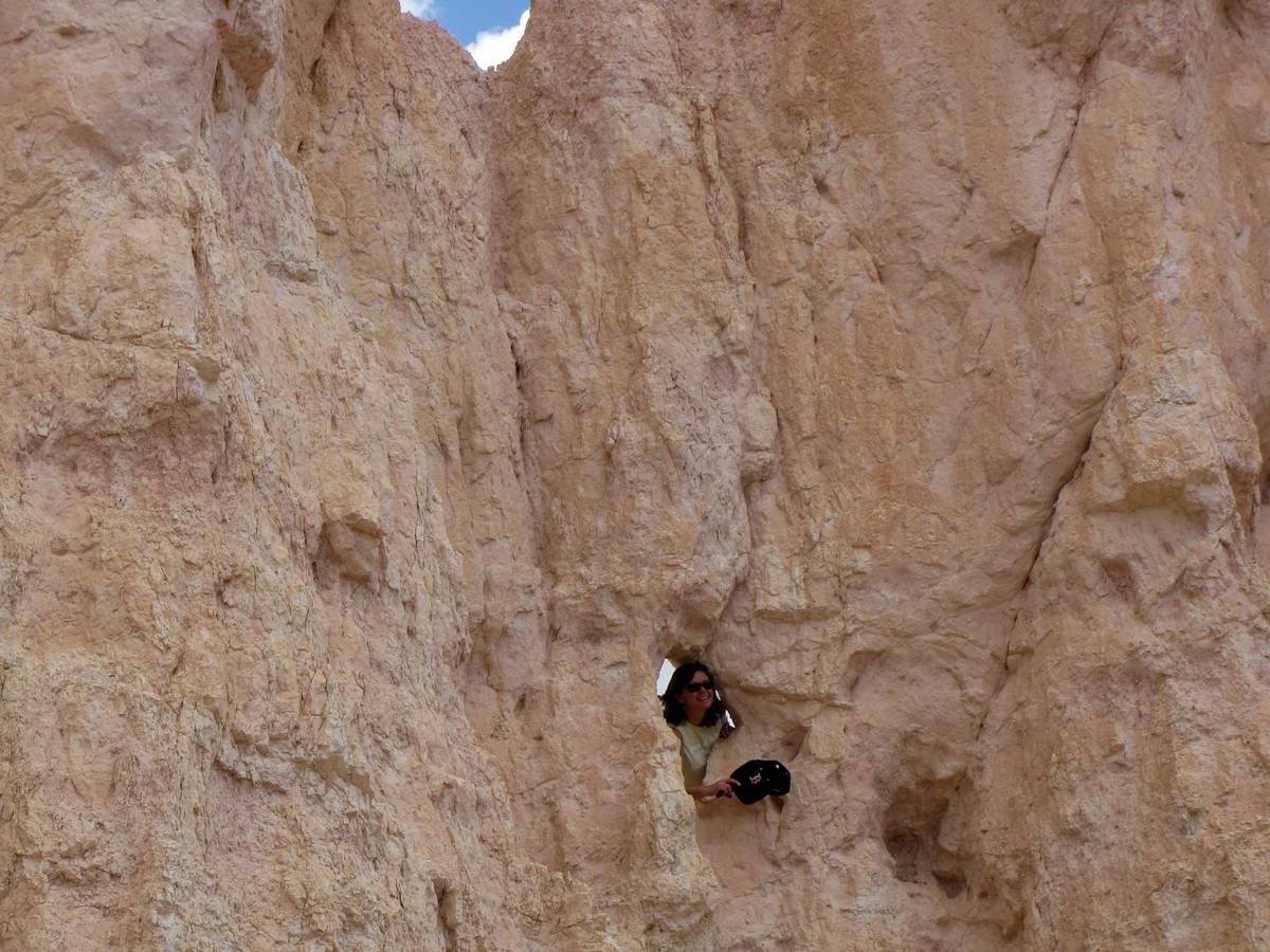 A person performing a workout using climbing gloves.